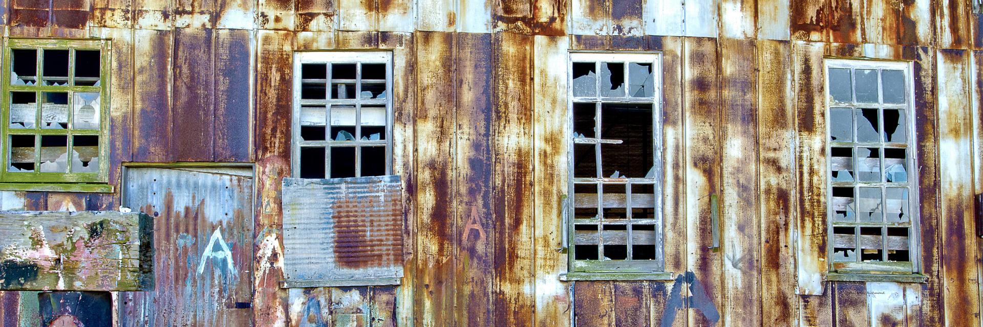 44318p abandonded rust weathered windows architecture,,.jpg
